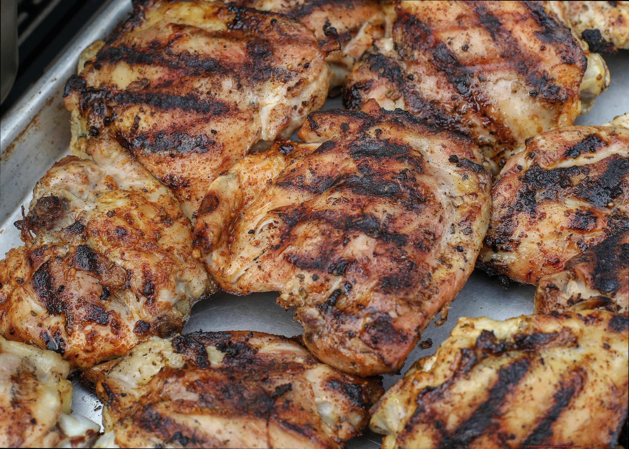 Do you grill chicken thighs skin side up or down first? Pastime Bar And Grill