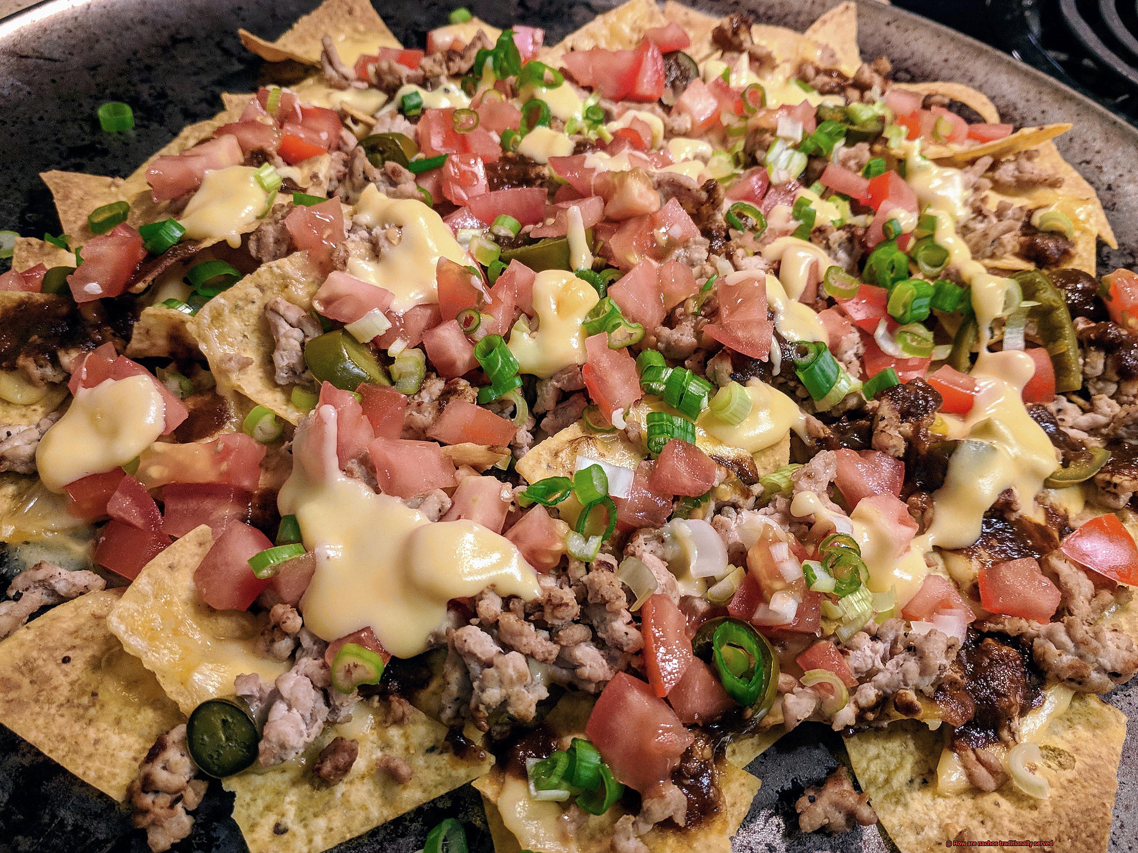 How are nachos traditionally served-2